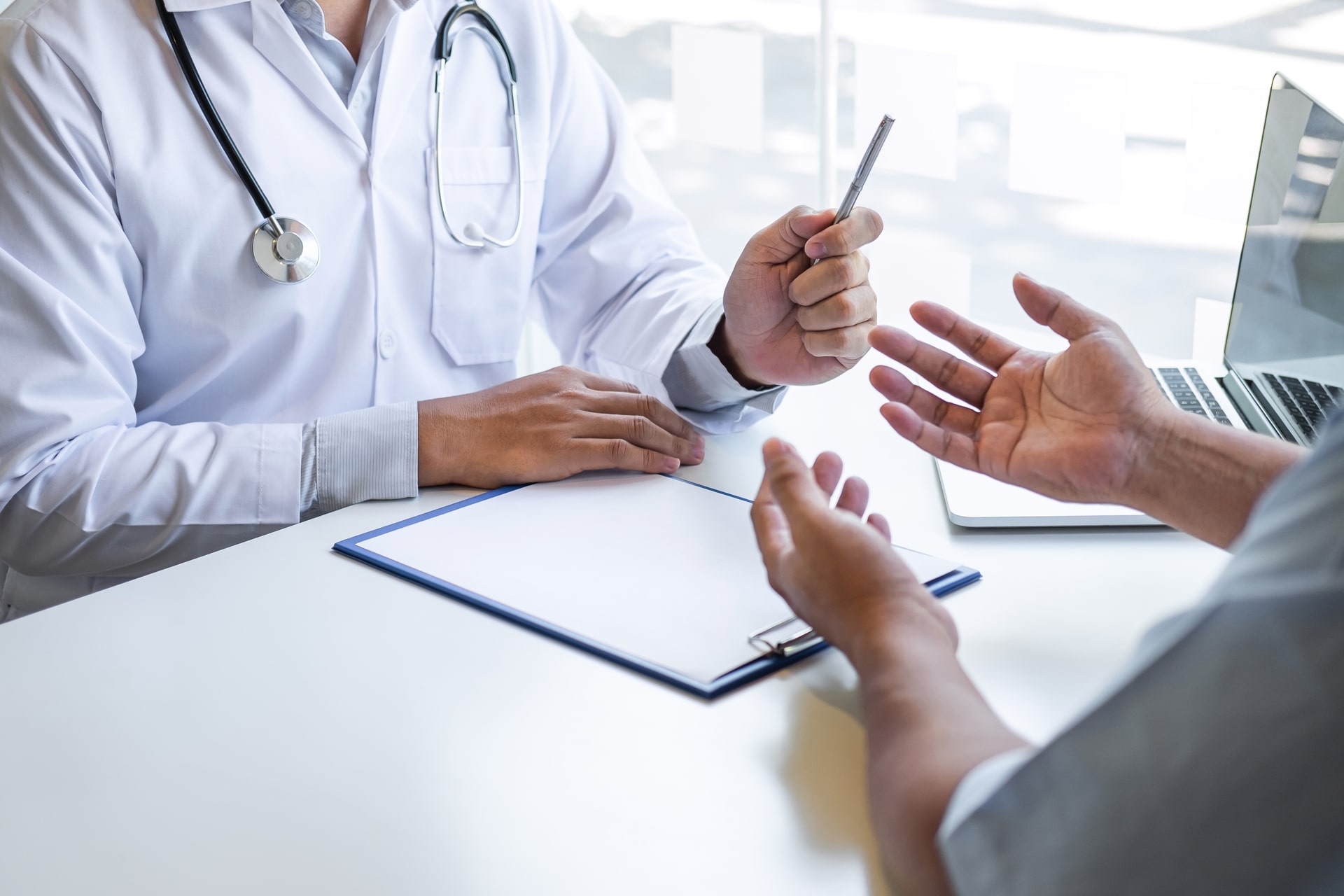 Phantom Medical team consulting with a patient